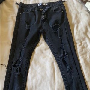 distressed black skinny jeans